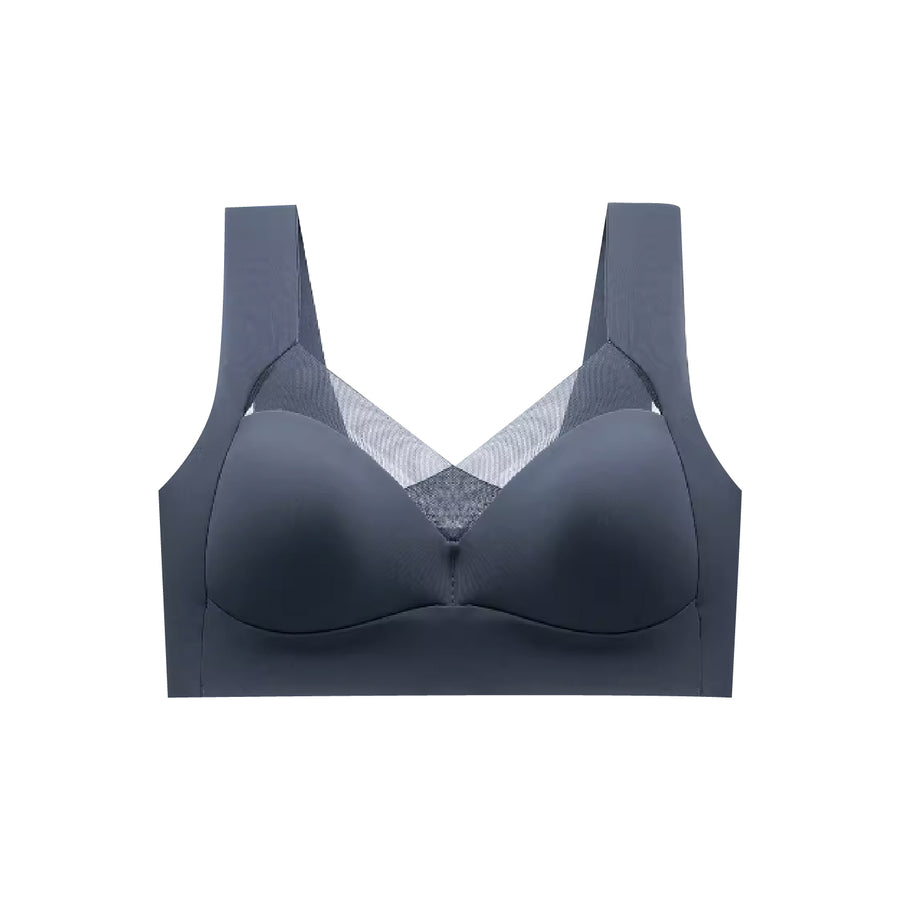 Chantelle's Secret sports bra in dark blue featuring a mesh neckline insert, smooth seams, and wireless support for comfortable, stylish athletic wear.